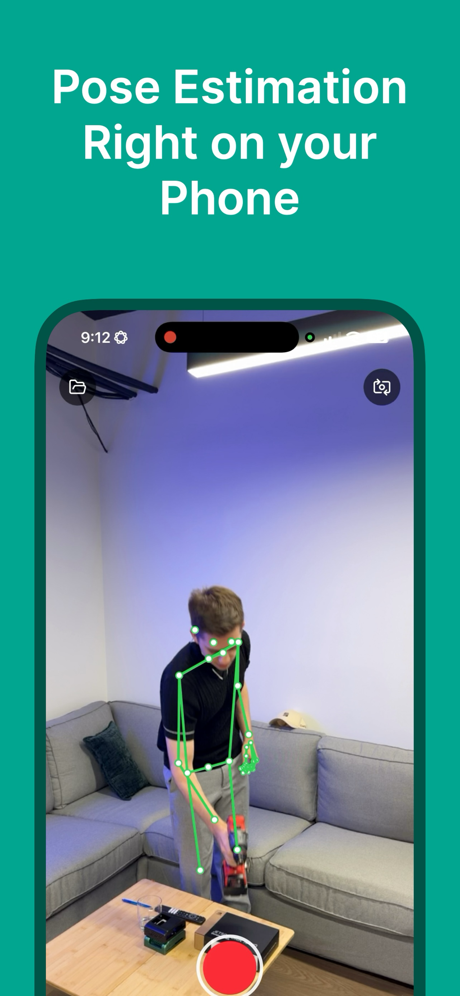 Live pose estimation running on an iPhone, skeleton drawn over a person operating a power drill