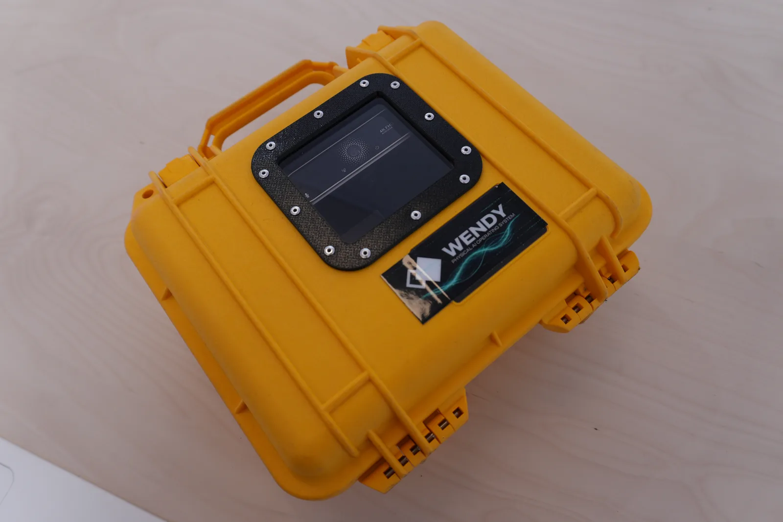 Top view of the closed yellow Wendy Box with camera window